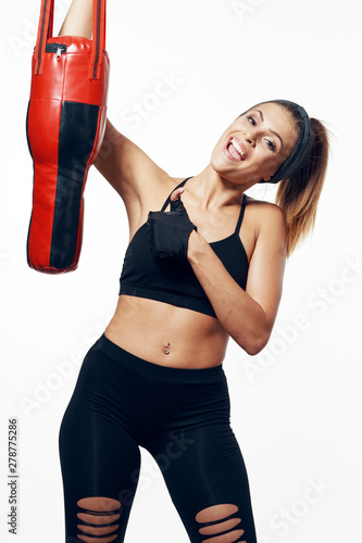 young woman with dumbbells