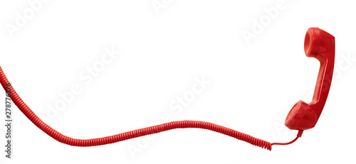 Red vintage telephone handset isolated on white background with copy space photo