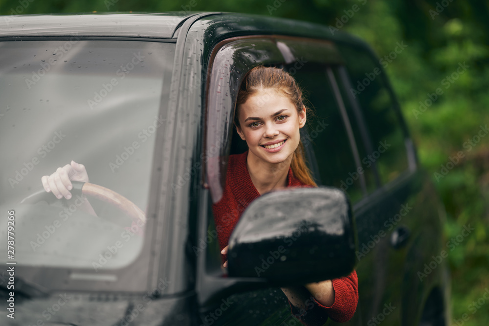 young woman in car young woman in car