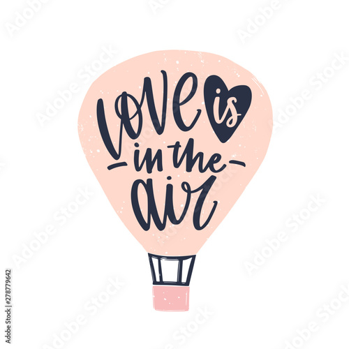 Love Is In The Air phrase handwritten with elegant cursive calligraphic font on air balloon