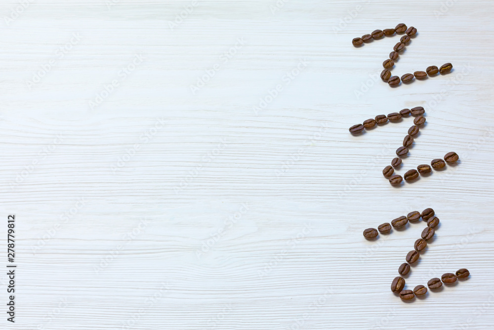 Alphabet Zzz laid out of grains symbolizing sleep on structural white wooden background, on right side