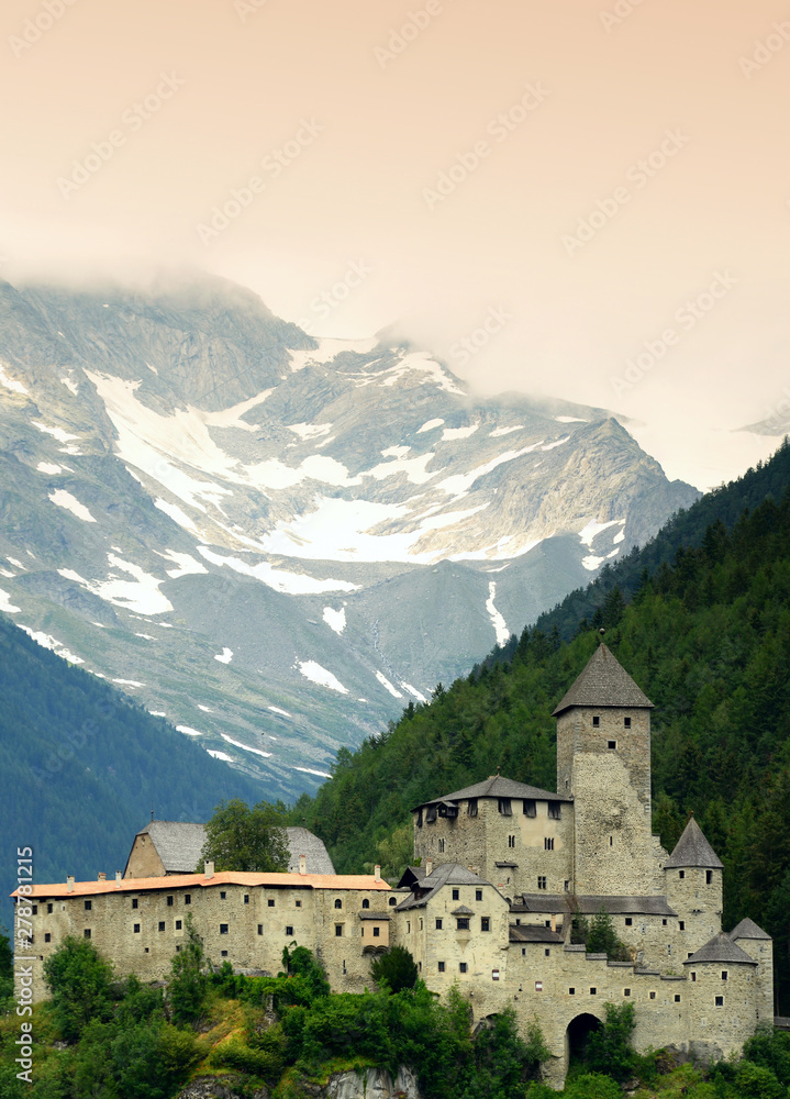 Aurino Torrent in Valle Aurina near Brunico (BZ) with Tures Castle on the background. South Tyrol, Italy.