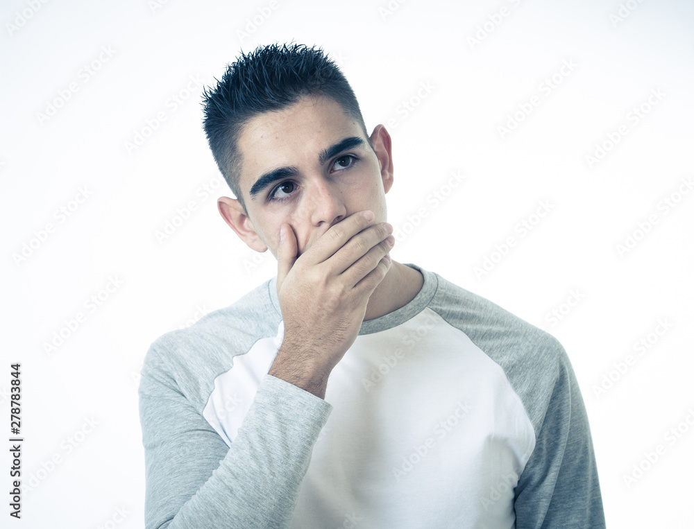 Close up portrait of sad young man face suffering from depression, stress and unhappiness. Close up portrait of sad young man face suffering from depression, stress and unhappiness.