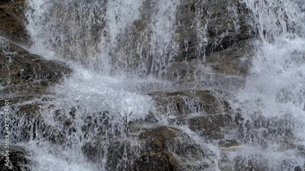 Crystal clear mountain waterfall slow motion Crystal clear mountain waterfall slow motion