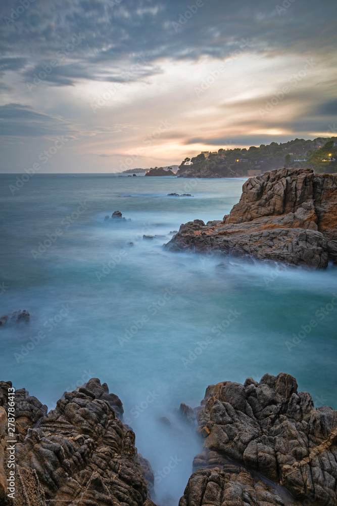 Beautiful sunset light in Costa Brava of Spain, near town Palamos, long exposure picture