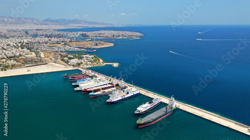 Aerial drone photo of industrial cargo area with cranes, container ships and logistics, Piraeus port, Drapetsona, Perama, Attica, Greece photo