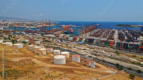 Aerial drone photo of industrial cargo area with cranes, container ships and logistics, Piraeus port, Drapetsona, Perama, Attica, Greece © aerial-drone