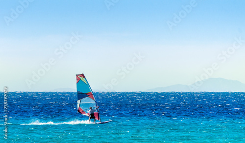 Wallpaper Mural windsurfer on the background of high mountains rides on the waves of the Red Sea in Egypt Dahab South Sinai Torontodigital.ca