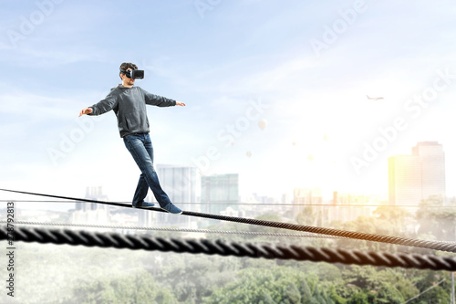 Virtual reality experience. Man wearing VR headset