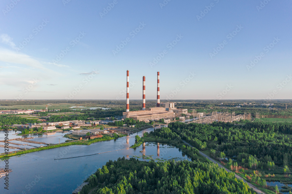 Scenic aerial view of the largest thermal power plant in Europe. Beautiful summer sunny look of big electricity station in sunset light