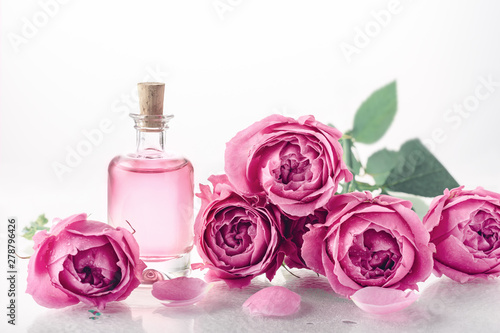 Roses, perfume essence.