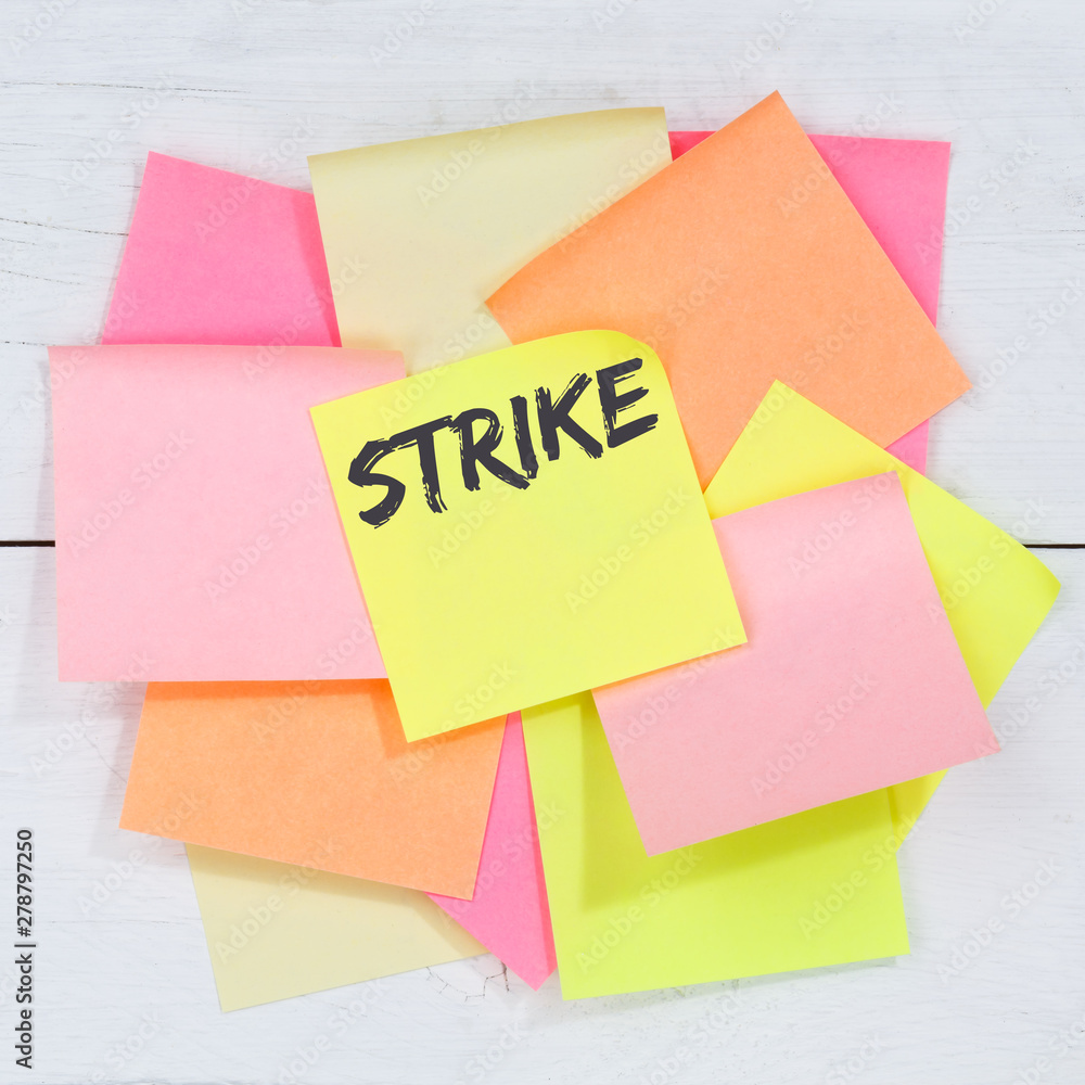 Strike protest action demonstrate jobs, job employees business concept desk note paper Strike protest action demonstrate jobs, job employees business concept desk note paper