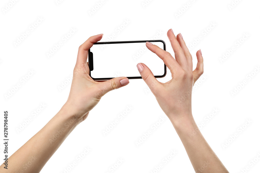 Smartphone in female hands isolated on white background Smartphone in female hands isolated on white background