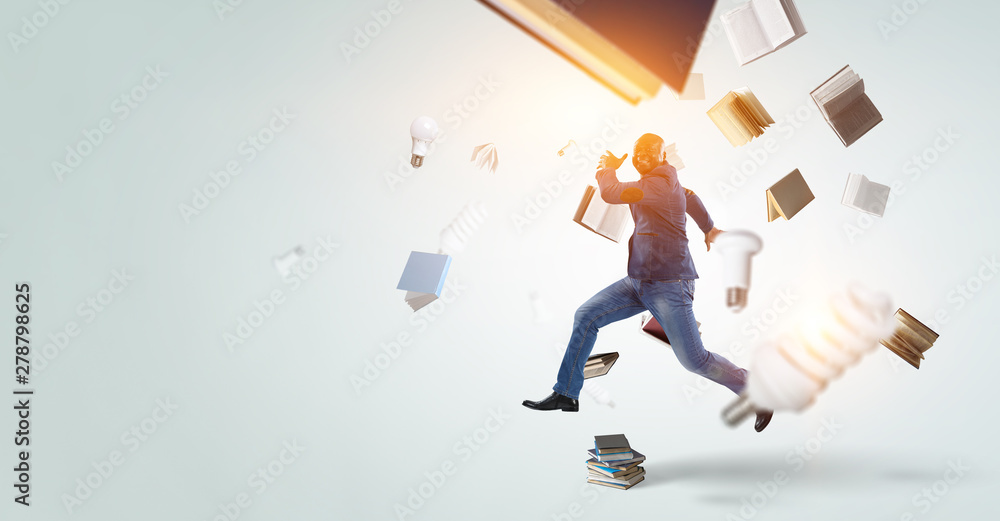 Businessman jumping of happiness. Mixed media Businessman jumping of happiness. Mixed media