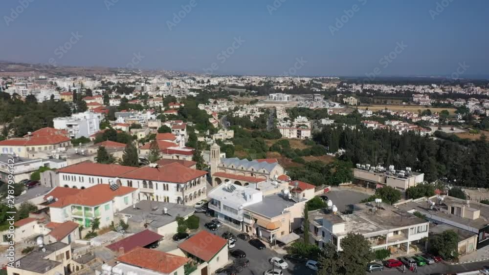 Aerial view flying over Paphos City, Cyprus and the Saint Theodore church and gallows Aerial view flying over Paphos City, Cyprus and the Saint Theodore church and gallows