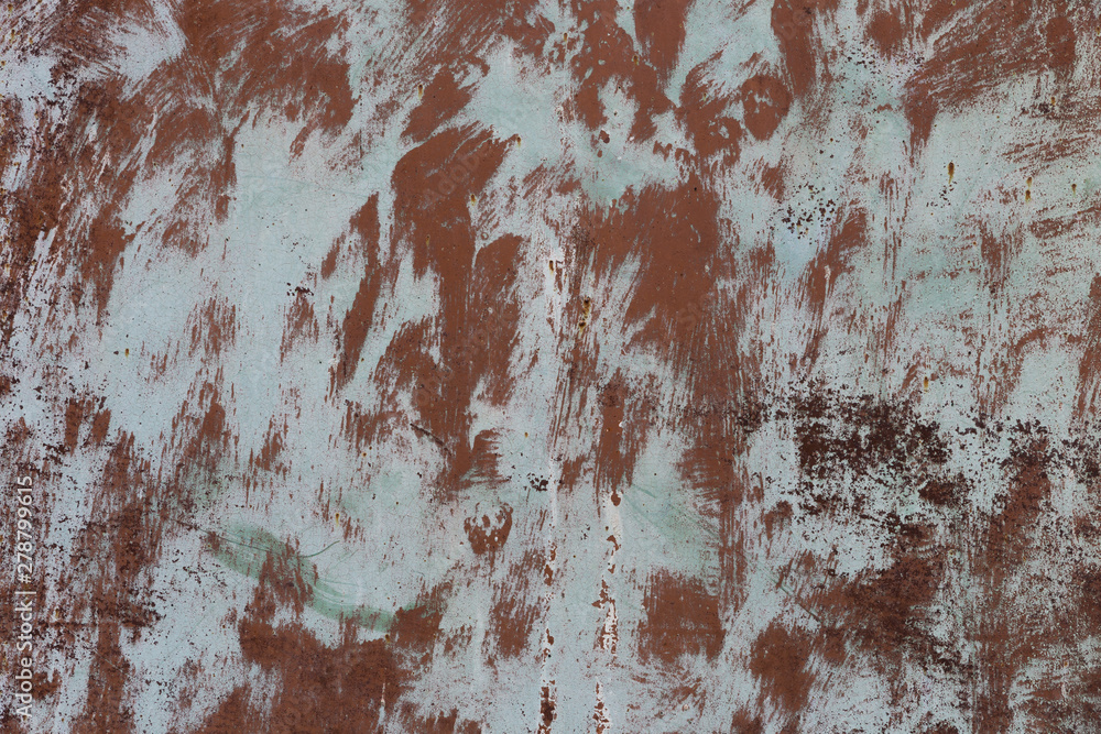 Brown and gray spots of old paint on a metallic surface. Grunge texture. Brown and gray spots of old paint on a metallic surface. Grunge texture.