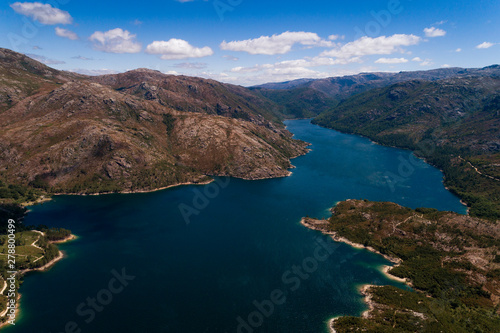 Aerial scenic view of the lake at the Vilarinho das Furnas Dam, Peneda Geres National Park, in Portugal. © Tiago Fernandez