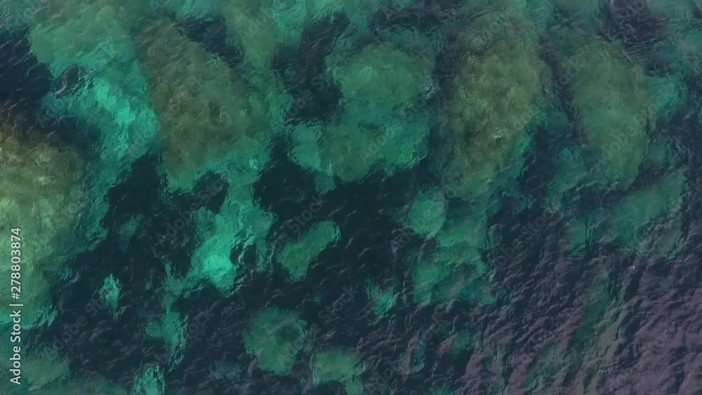 Aerial view of the boulders in the shallow Mediterranean sea Aerial view of the boulders in the shallow Mediterranean sea