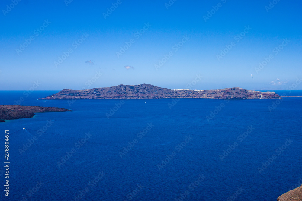 peacefull view of Thirassia island in aegean sea