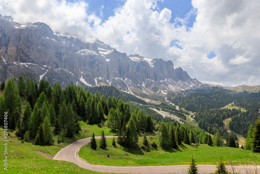 a mountain road in the dolomites