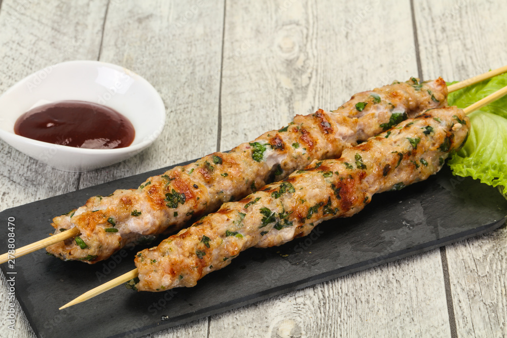 Minced pork skewer kebab with sauce Minced pork skewer kebab with sauce