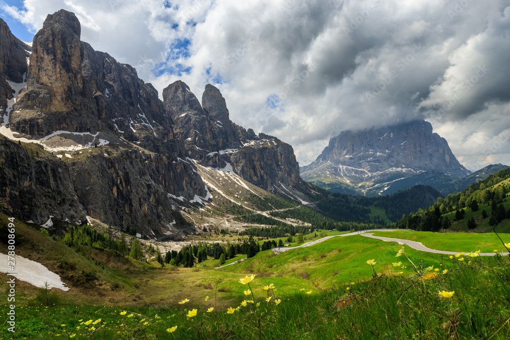 a mountain road in the dolomites