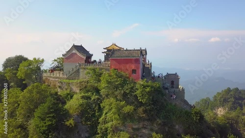 Aerial landscape to the Golden Palace has a very long history. Its architecture is brilliant. It is golden in color. It can be seen sparkling from thousands of miles away. Wudang Mountains, China. photo