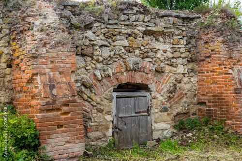 An old cellar of bricks and stones on the territory of the estate Gorodnya (Galician nobles) near Kaluga. Ferzikovsky District, Kaluzhskiy region, Russia - July 2019