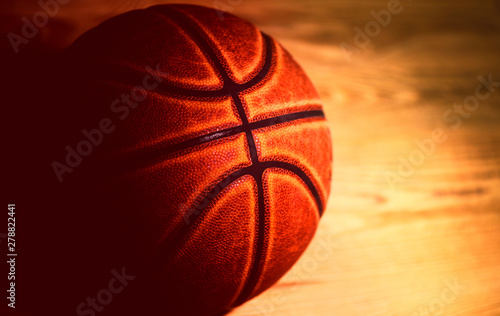 basketball ball on wooden background.