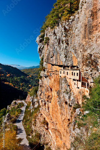 The holy monastery of Kipina, "hanging" from a cliff in Tzoumerka mountainous region, Ioannina, Epirus, Greece.