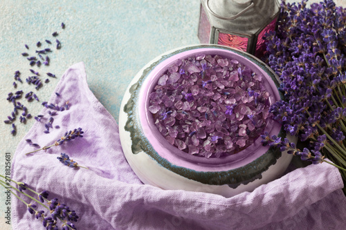 Bath salt in a bowl and lavender flowers on the table  relax