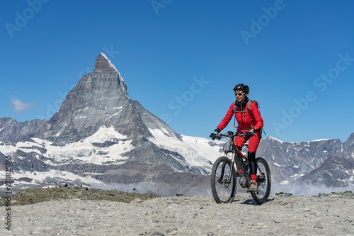 active senior woman, riding...