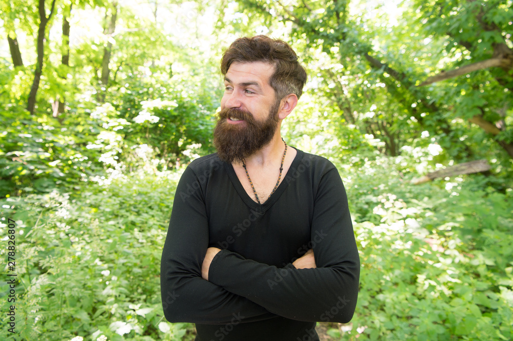 Summer heat season. Wild nature. Man bearded hipster bright foliage background. Guy relax in forest. Exploring nature. Handsome man with beard and mustache in nature. Brutality of jungles concept Summer heat season. Wild nature. Man bearded hipster bright foliage background. Guy relax in forest. Exploring nature. Handsome man with beard and mustache in nature. Brutality of jungles concept