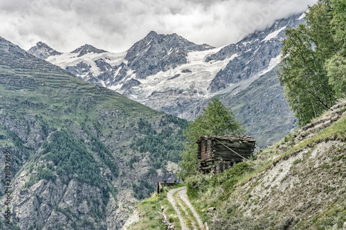 traditional wooden house high above  the village of Taesch  near Zermatt  the famous touristic destination in the canton Valais  Wallis  Switzerland