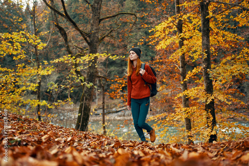 woman walking in autumn park © SHOTPRIME STUDIO