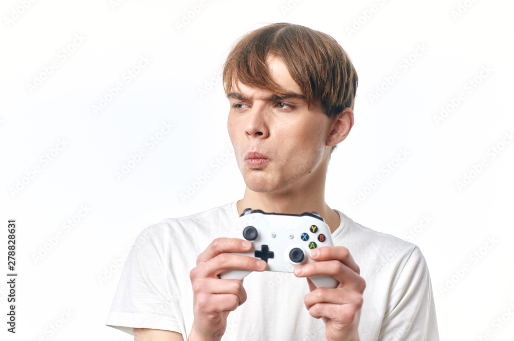 portrait of young man with remote control portrait of young man with remote control