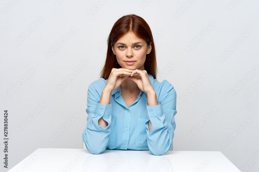 young woman sitting on the floor