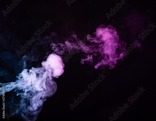 Texture of colored smoke on a black background