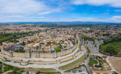 French ancient town Carcassonne panoramic view. Old castle with high stone walls. Famous tourist destionation in France, South Europe.