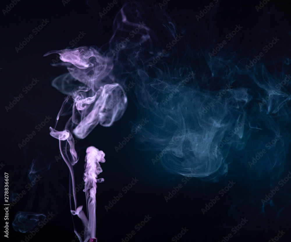 Fototapeta premium Abstract colorful smoke on black background .