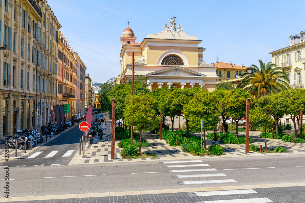 Street view of Nice, Cote d'Azur, France, South Europe. Beautiful city and luxury resort of French riviera. Famous tourist destination with nice beach on Mediterranean sea