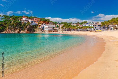 Sea landscape Llafranc near Calella de Palafrugell, Catalonia, Barcelona, Spain. Scenic old town with nice sand beach and clear blue water in bay. Famous tourist destination in Costa Brava © oleg_p_100