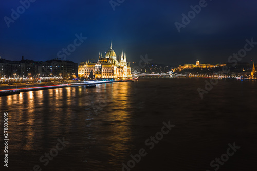 Night view of Budapest. Panorama cityscape of famous tourist destination with Danube  parliament and bridges. Travel illuminated landscape in Hungary  Europe.