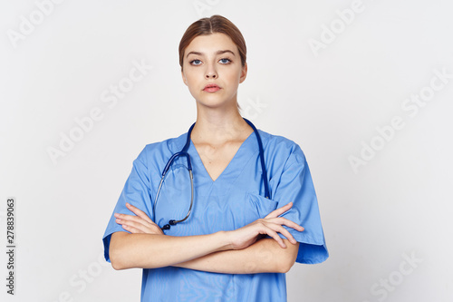 portrait of a female doctor isolated on white