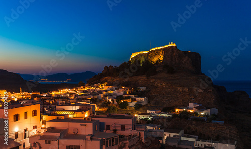 Konstfotografi Scenic landscape photo of night Lindos town and castle on Rhodes island, Dodecanese, Greece