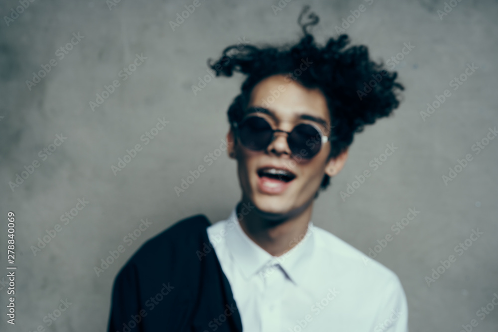 portrait of young man in sunglasses portrait of young man in sunglasses