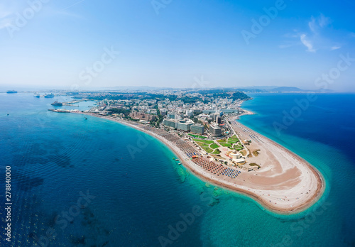 Aerial birds eye view drone photo of Elli beach on Rhodes city island, Dodecanese, Greece. Panorama with nice sand, lagoon and clear blue water. Famous tourist destination in South Europe