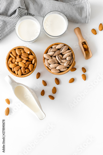 almond for cooking milk on white background top view mockup