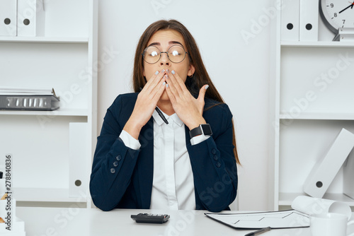 businesswoman talking on phone in office