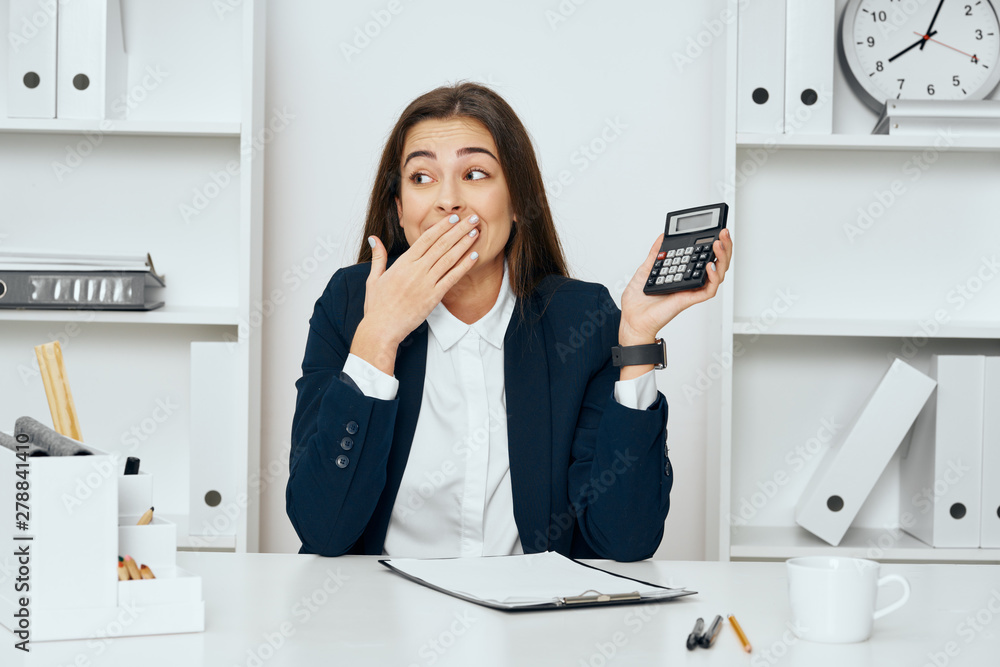 businesswoman talking on phone in office businesswoman talking on phone in office
